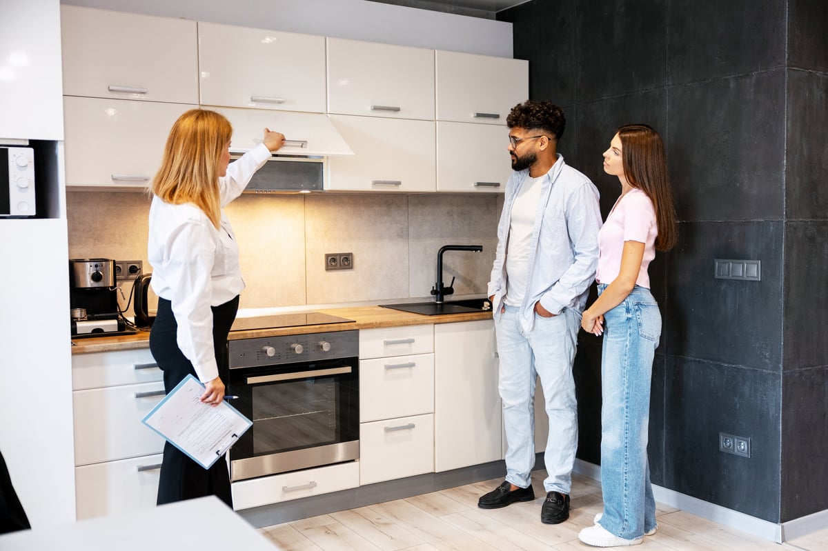 A ResQ League coordinator reviewing service options with a homeowner